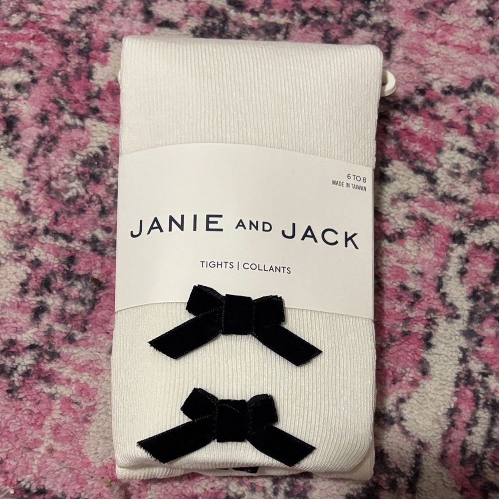 Janie and Jack Cream Tights with Black Velvet Bows